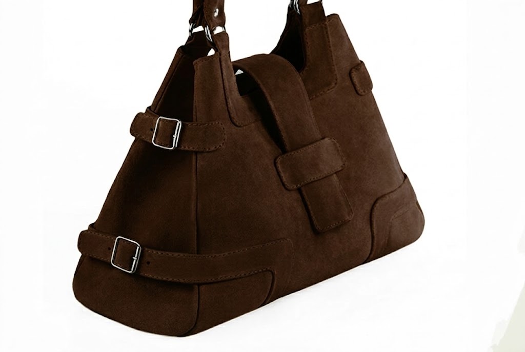 Handcrafted women's luxurious elegant handbag in premium dark brown leather. Perfect for elevated everyday style.   
                Choose from our luxurious collections of leather and fabric to perfectly match your handbags to your outfits.